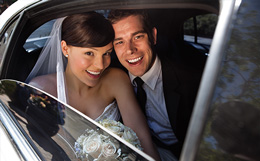 couple inside limo at wedding
